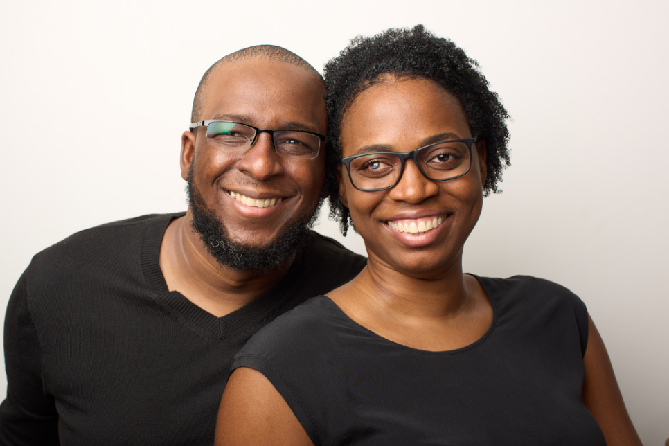 Fralene with her husband smiling happily